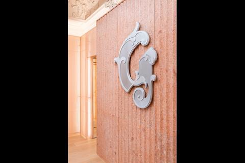 A logo in the new Glossier store